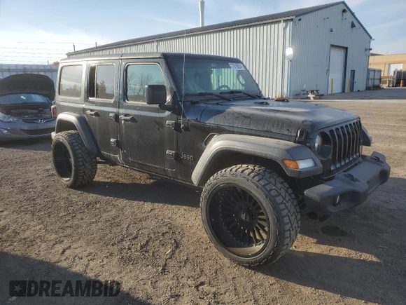 2023 Jeep Wrangler Sport S with VIN 1C4HJXDG3PW646818, listed as a Copart auction lot 77016834 with 12,118 mi miles and Clean Title. Bid and sale history available at DreamBid. Image 4.