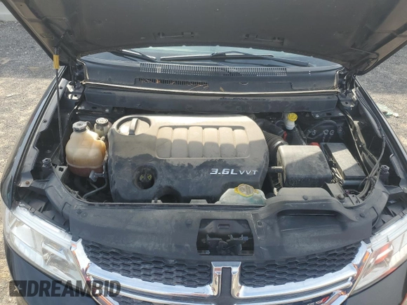 2013 Dodge Journey SXT with VIN 3C4PDCBG8DT601096, listed as a Copart auction lot 56187835 with 142,731 mi miles and Clean Title. Bid and sale history available at DreamBid. Image 11.