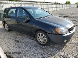 2005 Kia Spectra with VIN KNAFE161155153320, listed as a Copart auction lot 55231794 with 149,492 mi miles and Salvage Title. Bid and sale history available at carsss.com. Image 4.