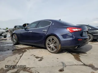 2015 Maserati Ghibli with VIN ZAM57XSA6F1146076, listed as a Copart auction lot 52474303 with 82,575 mi miles. Bid and sale history available at carsss.com. Image 2.