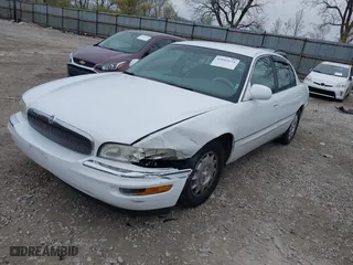 1999 Buick Park Avenue Ultra with VIN 1G4CU5217X4658627, listed as a IAAI auction lot 42013174 with 148,856 mi miles. Bid and sale history available at carsss.com. Image 17.
