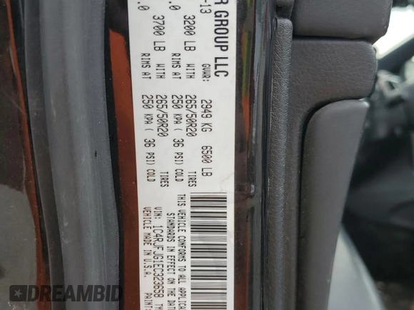2014 Jeep Grand Cherokee Summit with VIN 1C4RJFJG1EC323658, listed as a Copart auction lot 50740115 with 253,656 mi miles and Salvage title. Bid and sale history available at DreamBid. Image 15.