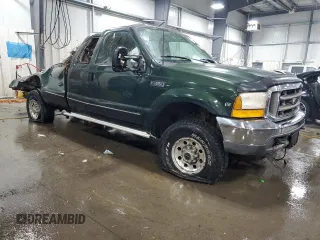 1999 Ford F-250 XL with VIN 1FTNX21S0XEA86579, listed as a Copart auction lot 71221184 with 169,104 mi miles and Non repairable. Bid and sale history available at DreamBid. Image 4.