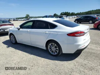 2020 Ford Fusion SE with VIN 3FA6P0LU0LR154013, listed as a Copart auction lot 54933055 with 122,197 mi miles and Salvage title. Bid and sale history available at DreamBid. Image 2.