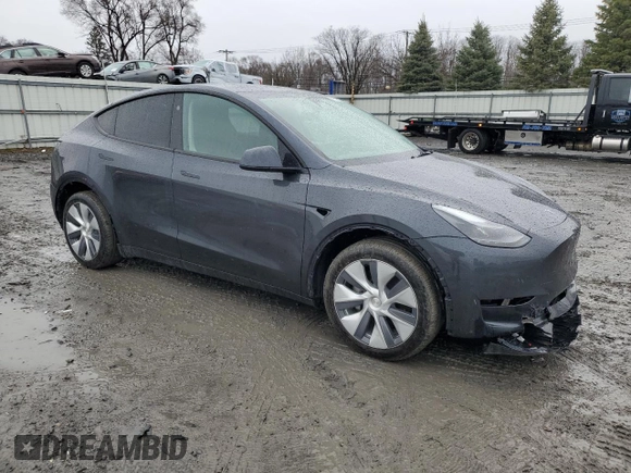 2024 Tesla Model Y Long Range with VIN 7SAYGDEE6RA278636, listed as a Copart auction lot 48718085 with 21,349 mi miles and Salvage Title. Bid and sale history available at DreamBid. Image 4.