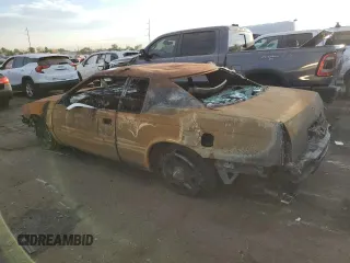 2001 Cadillac Eldorado ESC z VIN 1G6EL12Y81B110048, wystawiony jako Copart lot #69995914 z przebiegiem Nie podano mil oraz Nie do naprawy. Historia ofert i sprzedaży dostępna na DreamBid. Obrazek 2.