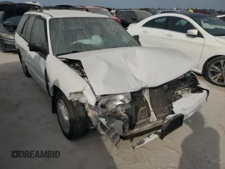 1995 Ford Escort z VIN 1FASP15J4SW388903, wystawiony jako Copart lot #75205214 z przebiegiem Nie podano mil oraz Szkody całkowita. Historia ofert i sprzedaży dostępna na DreamBid. Obrazek 4.