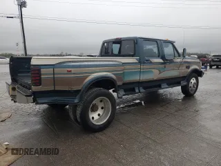 1996 Ford F-350 with VIN 1FTJW35F5TEB52509, listed as a Copart auction lot 51048475 with 199,464 mi miles and Salvage Title. Bid and sale history available at DreamBid. Image 3.