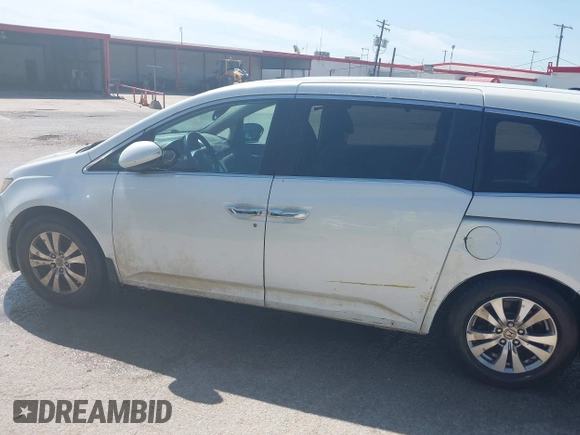 2014 Honda Odyssey EX-L z VIN 5FNRL5H61EB001509, wystawiony jako IAAI lot #42371539 z przebiegiem 259 195 mil mil oraz . Historia ofert i sprzedaży dostępna na DreamBid. Obrazek 14.