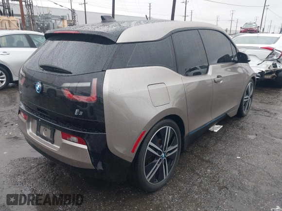 2014 BMW i3 with VIN WBY1Z4C58EV276329, listed as a IAAI auction lot 41570602 with 87,925 mi miles and . Bid and sale history available at DreamBid. Image 4.