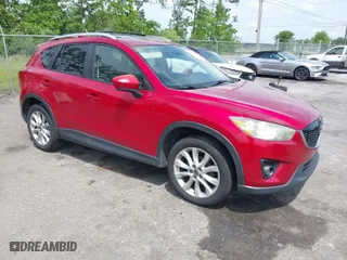 2014 Mazda CX-5 Grand Touring with VIN JM3KE2DY3E0382920, listed as a IAAI auction lot 42102876 with 324,608 mi miles. Bid and sale history available at carsss.com. Image 1.
