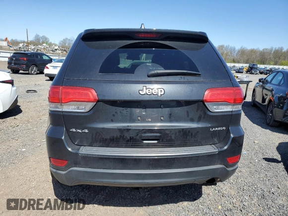 2014 Jeep Grand Cherokee Laredo with VIN 1C4RJFAG4EC210321, listed as a Copart auction lot 53574595 with 119,650 mi miles and Salvage Title. Bid and sale history available at DreamBid. Image 6.