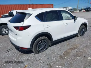 2021 Mazda CX-5 Touring z VIN JM3KFBCM2M1395663, wystawiony jako IAAI lot #41948073 z przebiegiem 47 029 mil mil oraz . Historia ofert i sprzedaży dostępna na DreamBid. Obrazek 4.