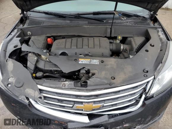 2017 Chevrolet Traverse Premier with VIN 1GNKVJKD4HJ174490, listed as a Copart auction lot 43977115 with 130,144 mi miles and Salvage Title. Bid and sale history available at DreamBid. Image 12.