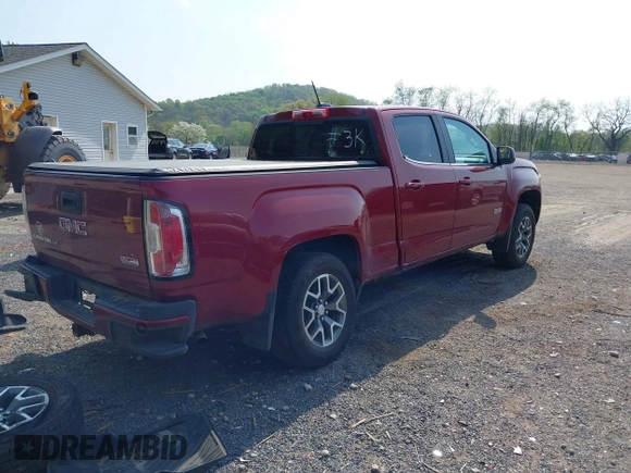 2019 GMC Canyon 4WD All Terrain z VIN 1GTG6FEN1K1290802, wystawiony jako IAAI lot #42150541 z przebiegiem 41 296 mil mil oraz . Historia ofert i sprzedaży dostępna na DreamBid. Obrazek 4.
