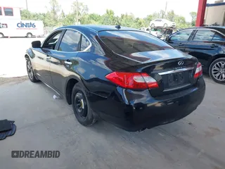 2012 Infiniti M with VIN JN1BY1AP1CM335867, listed as a IAAI auction lot 42169743 with 148,650 mi miles and . Bid and sale history available at DreamBid. Image 3.