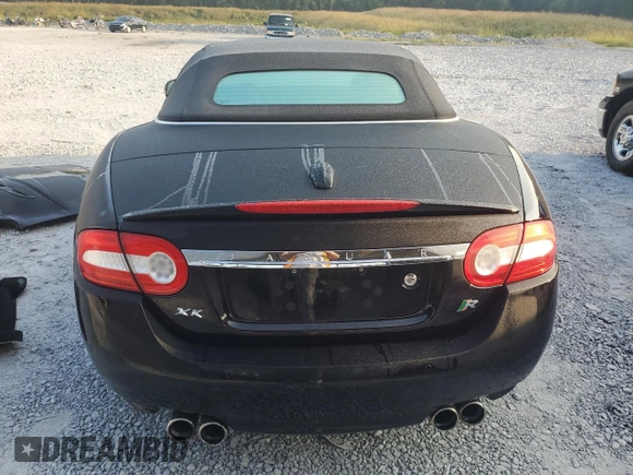 2010 Jaguar XK XKR with VIN SAJWA4ECXAMB35230, listed as a Copart auction lot 70893904 with 23,209 mi miles and Salvage Title. Bid and sale history available at carsss.com. Image 6.