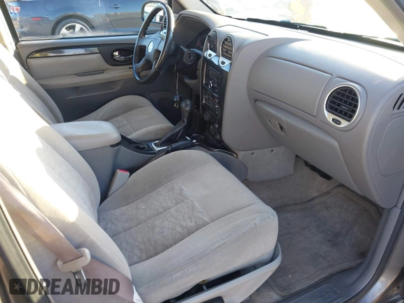 2005 GMC Envoy SLT with VIN 1GKDT13S152373799, listed as a IAAI auction lot 41537512 with 187,750 mi miles. Bid and sale history available at carsss.com. Image 5.