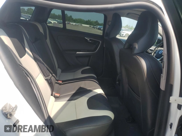 2018 Volvo V60 with VIN YV440MWKXJ2059075, listed as a Copart auction lot 60654775 with 58,040 mi miles and Salvage title. Bid and sale history available at DreamBid. Image 11.