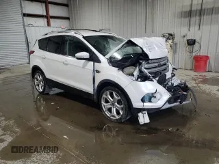 2019 Ford Escape Titanium z VIN 1FMCU9J97KUA85865, wystawiony jako Copart lot #56643135 z przebiegiem Nie podano mil oraz Szkoda całkowita • Salvage title. Historia ofert i sprzedaży dostępna na DreamBid. Obrazek 4.