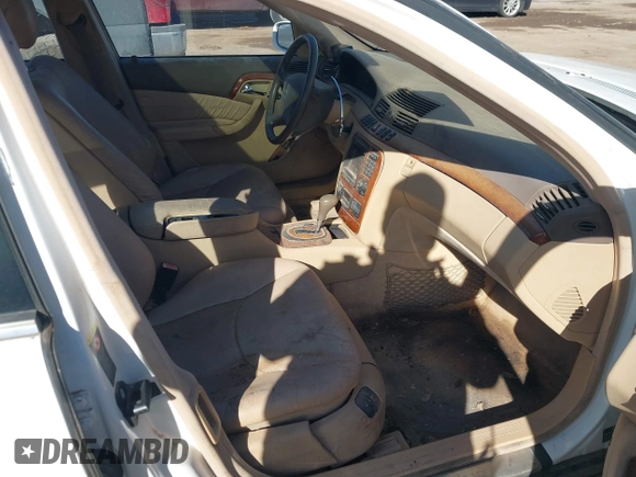 2002 Mercedes-Benz S-Class 4.3L with VIN WDBNG70J52A275068, listed as a IAAI auction lot 41570286 with 123,211 mi miles. Bid and sale history available at carsss.com. Image 5.