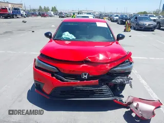 2023 Honda Civic Sport with VIN 2HGFE2F5XPH548055, listed as a IAAI auction lot 42513994 with 37,502 mi miles and . Bid and sale history available at DreamBid. Image 6.