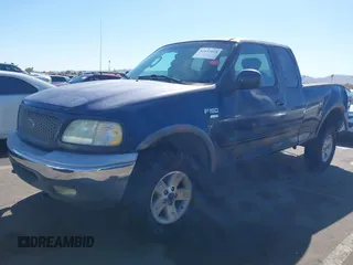 2003 Ford F-150 XL with VIN 1FTRX18WX3NA22323, listed as a IAAI auction lot 41635869 with 129,029 mi miles. Bid and sale history available at carsss.com. Image 17.