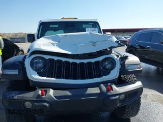2024 Jeep Wrangler Rubicon with VIN 1C4PJXFG6RW291185, listed as a IAAI auction lot 41773050 with 12,400 mi miles and . Bid and sale history available at DreamBid. Image 12.