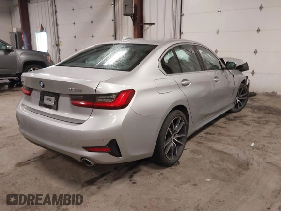 2019 BMW 3 Series 330i xDrive with VIN WBA5R7C53KAJ86493, listed as a IAAI auction lot 41559974 with 55,391 mi miles. Bid and sale history available at carsss.com. Image 4.