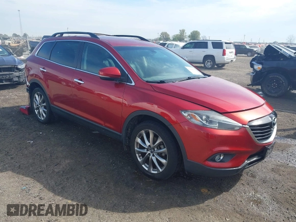 2015 Mazda CX-9 Grand Touring with VIN JM3TB3DA7F0448943, listed as a IAAI auction lot 41888414 with 104,052 mi miles. Bid and sale history available at carsss.com. Image 1.