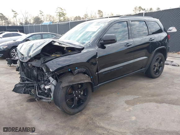 2019 Jeep Grand Cherokee Laredo E with VIN 1C4RJEAGXKC571770, listed as a IAAI auction lot 41677487 with 113,089 mi miles. Bid and sale history available at carsss.com. Image 17.