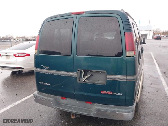 1997 GMC Savana Passenger with VIN 1GDFG15R6V1004277, listed as a IAAI auction lot 41462401 with NaN miles. Bid and sale history available at carsss.com. Image 16.