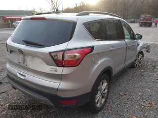 2018 Ford Escape SEL with VIN 1FMCU9HD6JUA58844, listed as a IAAI auction lot 40863795 with 74,907 mi miles. Bid and sale history available at carsss.com. Image 4.