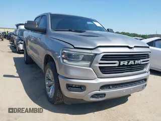 2023 Ram 1500 Laramie with VIN 1C6SRFJT6PN659232, listed as a IAAI auction lot 42024644 with 67,201 mi miles and . Bid and sale history available at DreamBid. Image 1.