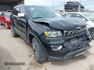 2021 Jeep Grand Cherokee 80th Anniversary with VIN 1C4RJFBG8MC645520, listed as a IAAI auction lot 41920038 with 84,479 mi miles and . Bid and sale history available at DreamBid. Image 1.