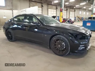 2014 Infiniti Q50 Premium with VIN JN1BV7ARXEM695977, listed as a Copart auction lot 52209795 with 100,700 mi miles and Salvage Title. Bid and sale history available at DreamBid. Image 4.