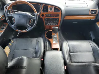 2001 Infiniti QX4 with VIN JNRDR09X21W204207, listed as a Copart auction lot 79935604 with Not Provided miles and Salvage Title. Bid and sale history available at DreamBid. Image 8.