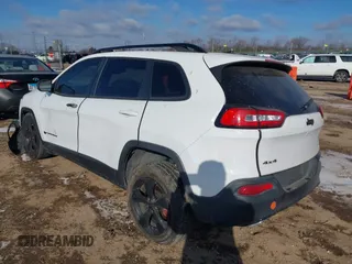 2015 Jeep Cherokee North with VIN 1C4PJMCS7FW792850, listed as a IAAI auction lot 41323432 with 102,642 mi miles. Bid and sale history available at carsss.com. Image 3.