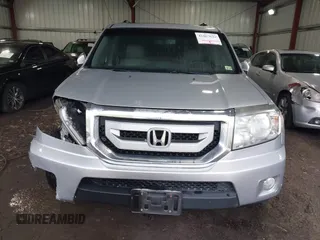 2011 Honda Pilot Touring with VIN 5FNYF4H90BB084692, listed as a IAAI auction lot 41867622 with 62,805 mi miles. Bid and sale history available at carsss.com. Image 12.