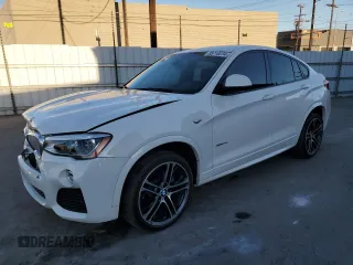 2015 BMW X4 xDrive35i with VIN 5UXXW5C53F0E88338, listed as a Copart auction lot 85719234 with 96,914 mi miles and Salvage Title. Bid and sale history available at carsss.com. Image 1.