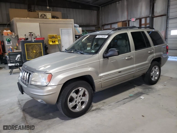 2003 Jeep Grand Cherokee Limited with VIN 1J4GW58NX3C572555, listed as a Copart auction lot 80675454 with 174,894 mi miles and Salvage Title. Bid and sale history available at carsss.com. Image 1.