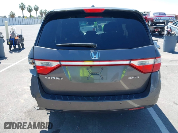 2012 Honda Odyssey Touring with VIN 5FNRL5H98CB011297, listed as a IAAI auction lot 42207061 with 154,073 mi miles and . Bid and sale history available at DreamBid. Image 16.