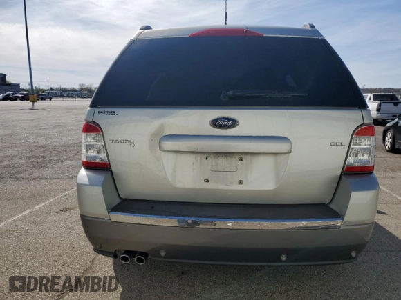 2008 Ford Taurus X SEL with VIN 1FMDK02W28GA05793, listed as a Copart auction lot 52317125 with 158,271 mi miles and Salvage title. Bid and sale history available at DreamBid. Image 6.