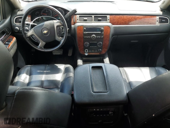 2014 Chevrolet Suburban LT with VIN 1GNSKJE77ER193143, listed as a Copart auction lot 54311935 with 171,407 mi miles and Salvage Title. Bid and sale history available at DreamBid. Image 8.