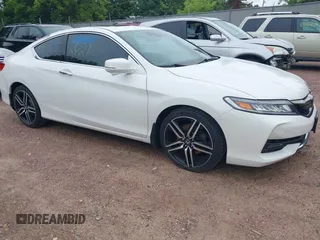 2016 Honda Accord Touring with VIN 1HGCT2B09GA007614, listed as a IAAI auction lot 42532621 with 200,935 mi miles and . Bid and sale history available at DreamBid. Image 1.