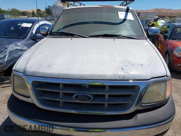 2001 Ford F-150 XLT with VIN 1FTRW07W21KE19926, listed as a IAAI auction lot 42750523 with Not provided miles and . Bid and sale history available at DreamBid. Image 6.