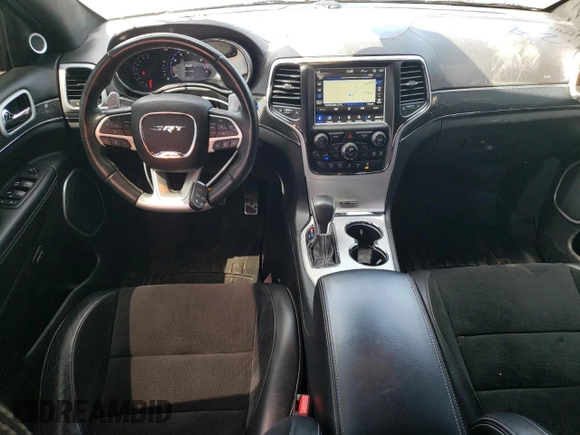 2018 Jeep Grand Cherokee with VIN NJ1449E, listed as a Copart auction lot 51357834 with 32,619 mi miles and Salvage title. Bid and sale history available at DreamBid. Image 8.