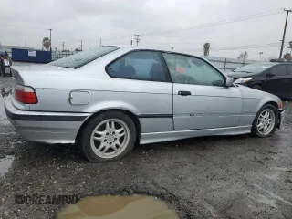 1998 BMW 3 Series 328is with VIN WBABG132XWET07045, listed as a Copart auction lot 49470225 with 186,922 mi miles and Clean Title. Bid and sale history available at carsss.com. Image 3.
