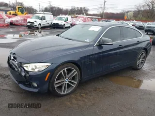 2016 BMW 4 Series 428i xDrive with VIN WBA4C9C59GG137067, listed as a IAAI auction lot 41913733 with 104,378 mi miles and . Bid and sale history available at carsss.com. Image 18.