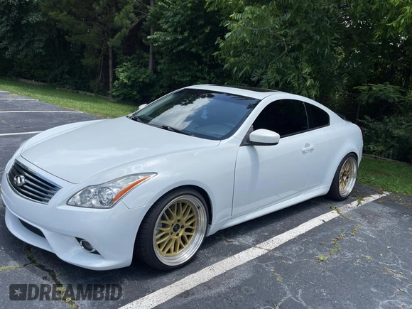 2014 Infiniti Q60 Journey с VIN JN1CV6EKXEM110777, выставлен на аукционе Copart как лот 60266245 с пробегом 128 272 миль миль и Чистый • Clean title. История ставок и продаж доступна на DreamBid. Изображение 2.